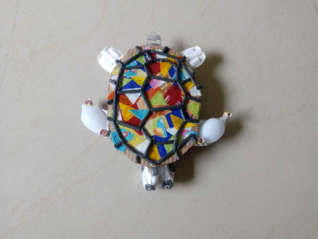 Create a simple paper turtle craft activity for kids